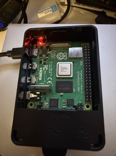 The finished Movie Leveler Pi, powered up in its case